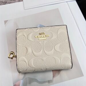 Coach Beige Embossed Wallet